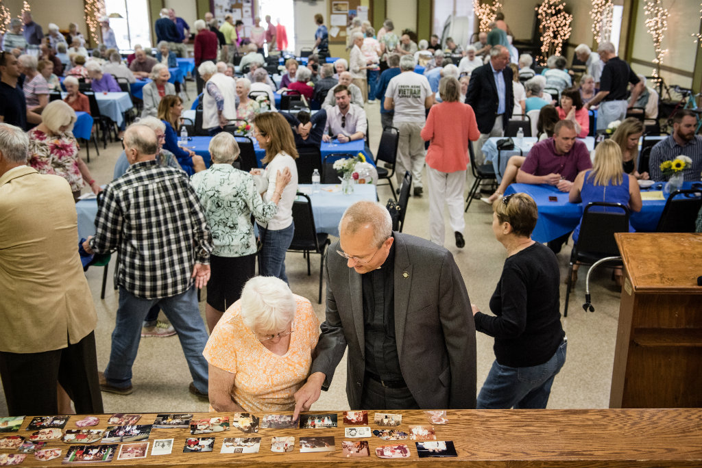 The Rev. Wally Arp, senior pastor of St. Luke's Lutheran Church, visits with Beverly Kilbey at a birthday party for a 100 year-old parishioner at Lutheran Haven on Saturday, March 5, 2016, in Oviedo, Fla. LCMS Communications/Erik M. Lunsford