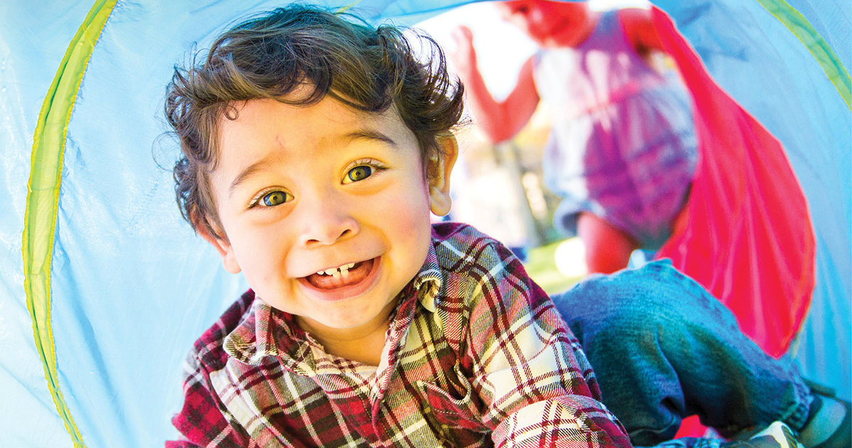 Xavier climbs through a play tunnel at ACTS of Love Early Childhood Education Center on Tuesday, Nov. 15, 2016, in Leander, Texas. LCMS Communications/Erik M. Lunsford