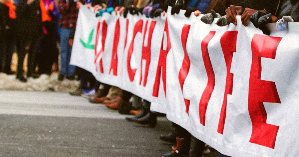 From throwing rocks to linking arms